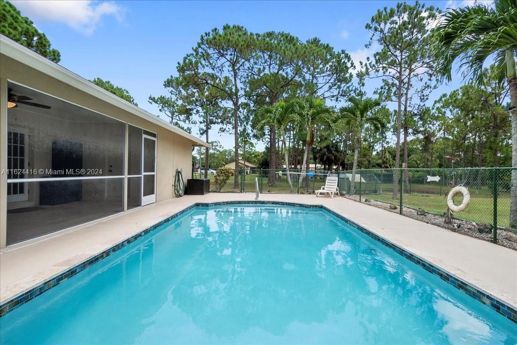 Photo of 16726 N 76th St, Loxahatchee, FL 33470 (MLS # A11624416)