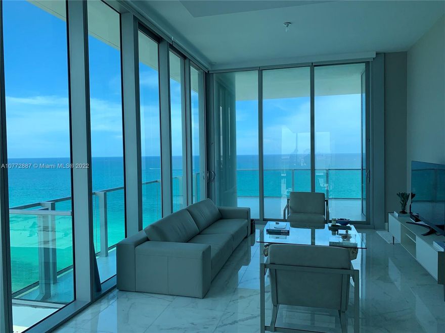 Oceanfront living in this Holly Hunt-designed structure.  11 Ft ceilings, sunrise & sunset views with large balconies fit for breakfast to dinner, and cocktails.  White marble floors, 24 hr valet, hammock garden, fitness center, and more.