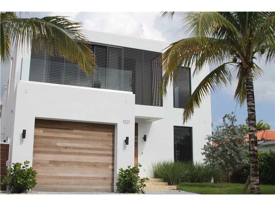 STUNNING MIAMI BEACH RESIDENCE LOCATED IN A GATED COMMUNITY. BEST PRICED NEW CONSTRUCTION BAY FRONT DEEP WATER OCEAN ACCESS HOME ON MIAMI BEACH. MODERN HIGH END DESIGN & EXECUTION BY KOBI KARP ARCHITECTS. WIDE BAY AND INDIAN CREEK ISLE VIEW. DOUBLE HEIGHT  CEILINGS, DESIGNER KITCHEN & BATHS. OPEN FLOORPLAN. POOL/SPA. NEW DOCK 15'X40' +/- WITH UTILITIES.  600+ SQFT ROOFTOP TERRACE WITH PANORAMIC VIEWS FROM DOWNTOWN TO AVENTURA ACCESSIBLE BY THREE TIER FLOATING MAIN STAIRCASE. 4 BED/BATH & MAIDS.