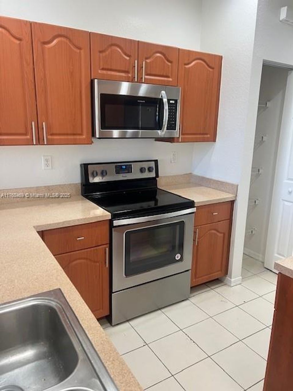 Photo of 6057 SW 19th Pl #6057, North Lauderdale, FL 33068 (MLS # A11768469)