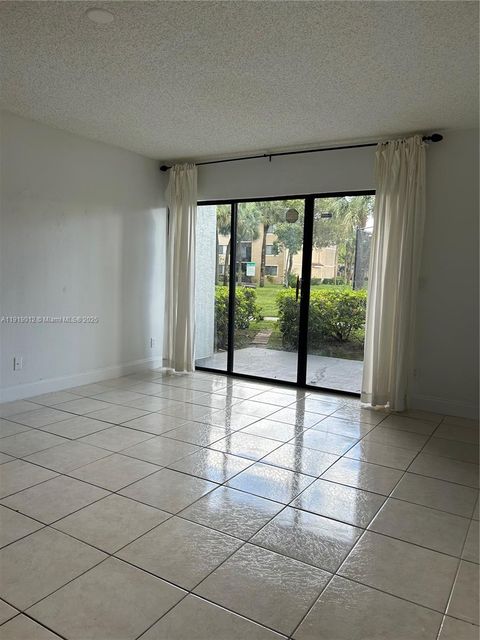 Photo of 9088 W Atlantic Blvd #518, Coral Springs, FL 33071 (MLS # A11919012)
