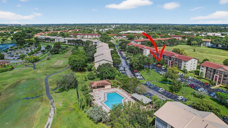 Freshly painted and newly floored ground-floor 2-bedroom, 2-bathroom condo offering a breathtaking panoramic view of the neatly manicured golf course at 1,351 sq. ft. The building sits peacefully in a quiet cul-de-sac, nestled near the well-known Butterfly Garden and just steps away from two satellite pools. Enjoy a sense of complete privacy and seclusion in this serene setting. The handicap-accessible breakfast nook and wide galley kitchen seamlessly connect to the dining area for an open, comfortable layout. The master bathroom features a shower, while both bedrooms include spacious walk-in closets. Vinyl flooring runs consistently throughout the entire condo. A stackable washer and dryer are conveniently included for added functionality.
