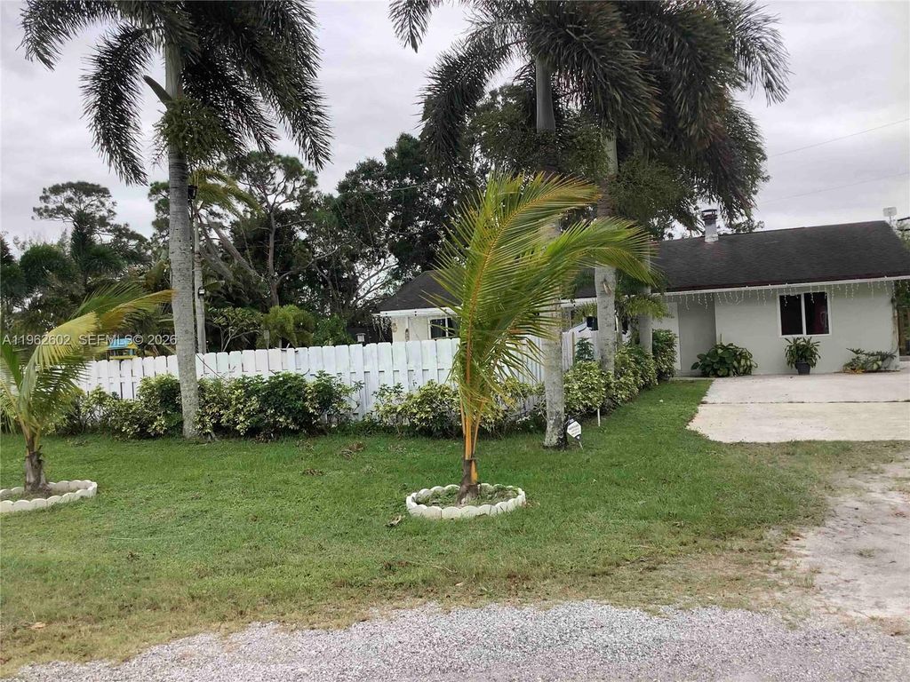 Photo of 10646 Barn Rd, Lake Worth, FL 33449 (MLS # A11962602)