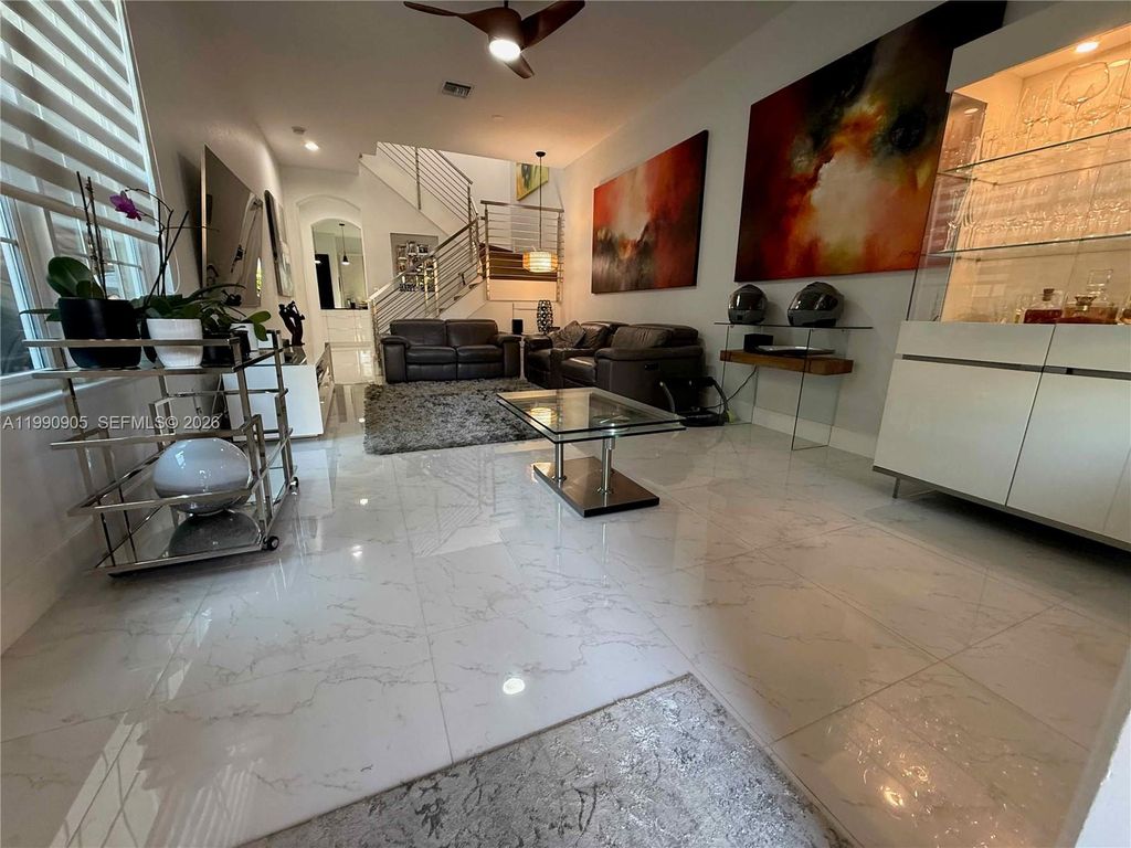 Photo of 6923 Julia Gardens Dr, Coconut Creek, FL 33073 (MLS # A11990905)