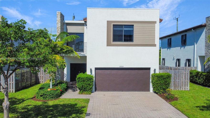 Welcome to this spacious and bright 4-bedroom, 3.5-bath single-family home ideally located in a quiet, family-friendly neighborhood. The home features a modern open-concept layout with kitchen boasting quartz countertops, stainless steel appliances, and ample storage. Enjoy laminate flooring throughout, updated bathrooms, and a large fenced backyard perfect for entertaining or relaxing outdoors. The property also includes a driveway with plenty of parking. Conveniently located near major highways, Aventura Mall, schools, and parks. Move-in ready—perfect as a primary residence or investment property!