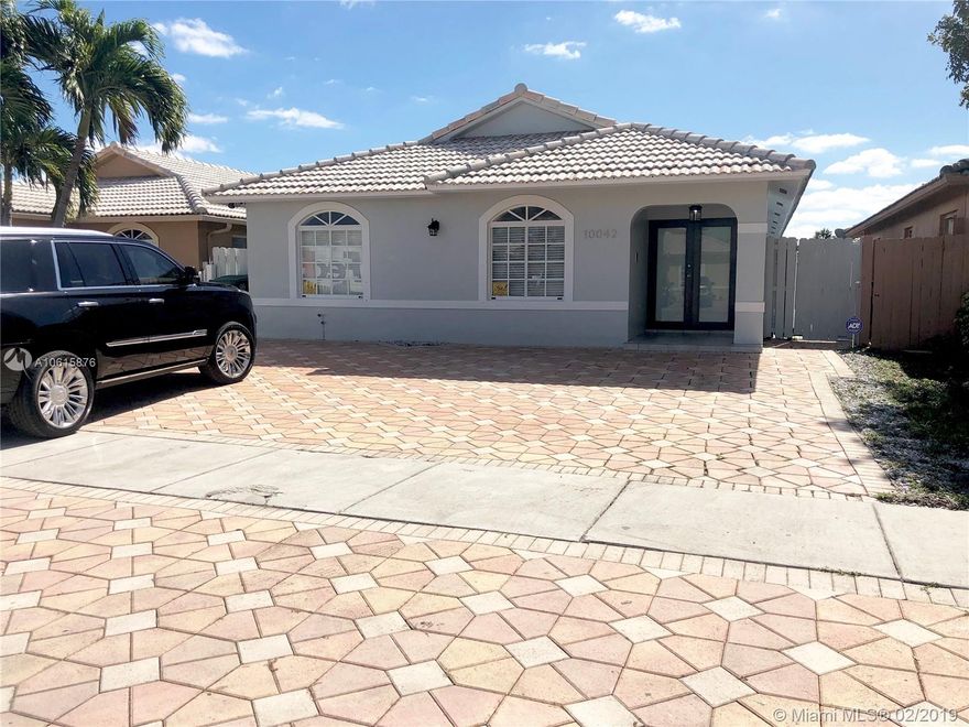 BEAUTIFUL 4/2 HOME IN HIALEAH GARDENS.FRONT DOOR WITH IMPACT GLASS,REMODELED BATHROOMS,STAINLEES STEEL APPLIANCES,TITAN WATER HEATER, VERY BRIGHT WITH HIGH CEILING, FLORIDA ROOM,LARGE KITCHEN WITH GRANITE COUNTER TOP,INTERCOM WITH MUSIC,OUTDOOR KITCHEN,SPLIT FLOORPLAN, MASTER ROOM  SEPARATED TO THE OTHERS ROOMS.CENTRALLY LOCATED CLOSE TO MAIN ROADWAYS,SHOPPING CENTERS AND SCHOOLS.BACK ON THE MARKET..