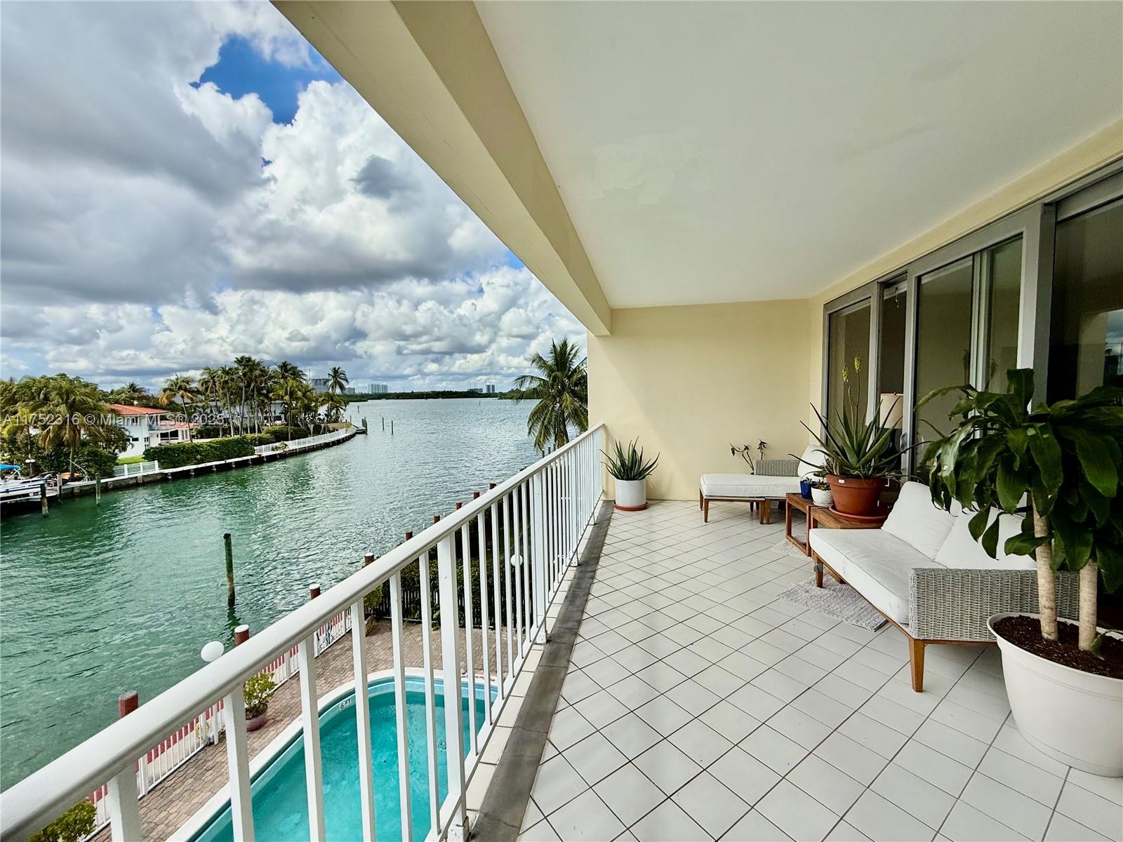 Stunning and spacious 2-bedroom, 2.5-bath SW corner, over 2,000 SF in an exclusive Bay Harbor waterfront boutique building. A rare opportunity to dock your boat and enjoy waterfront living at an unbeatable value—less than $500 per SF! The primary suite features two closets and a dual-sink bathroom. Recent upgrades include new hurricane-impact windows and doors, a new AC, and a new water heater. The building has passed its 50-year certification and includes two assigned parking spaces. Ideally located in charming Bay Harbor Islands, just minutes from Bal Harbour Shops, Surfside, the beach, top-rated schools, and places of worship. A true hidden gem and an incredible deal!