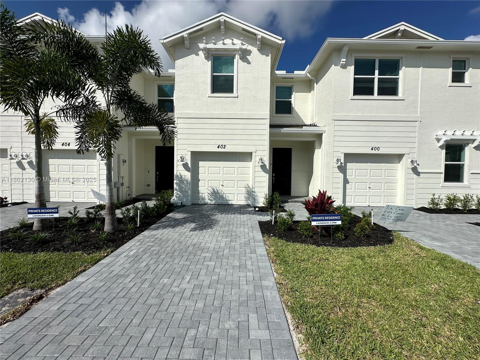 Two month's rent to move in (first month's rent and security deposit). Lake view Townhome in Port St. Lucie's gated community by Lennar, Veranda Landings. This Cocco model has upgrades made by the owner as a new light fixture in the dining area, ceiling fans in the living room and bedrooms, french door refrigerator, high efficiency washer & dryer, garage epoxy flooring, stain steel transitions from carpet to bathroom's tile and more. The patio has lake views for you to enjoy the sunset. Ideal location next to Florida’s Turnpike and close to I-95. Easy access to dining, shopping, nearby Jensen Beach; with Tesoro Golf Club right across the street! The amenities are: gated entrance, pool cabana with covered terrace, a resort-style pool. Fision Wifi and landscaping are included.