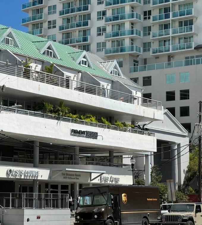 Experience boutique-style living in this low-density, pet friendly building with only 11 residences. Elegantly updated and spacious, this 2-story unit features; sleek stainless steel appliances, rich wood and tile flooring, in-unit washer and dryer, and central AC. Includes two parking spaces in a secure covered garage. Situated in vibrant Coconut Grove, walking access to everything you need; Coco-Walk, outstanding dining, shopping, a movie theatre, Dinner Key Marina, dog parks and numerous other attractions. With its unmatched location and life style offerings, you'll find this the perfect place to call home.