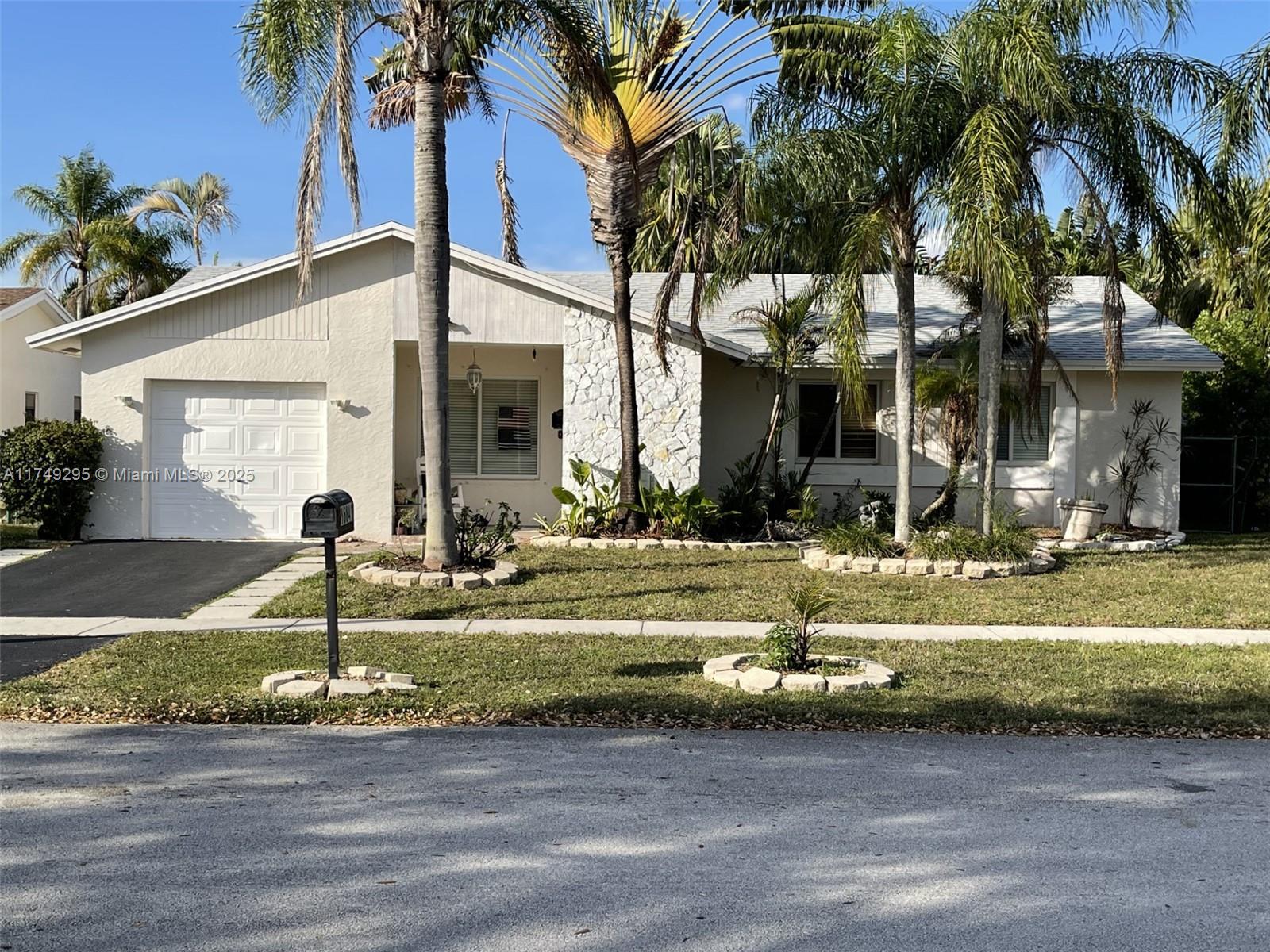 Property for Sale at 16841 Royal Poinciana Dr, Weston, Broward County, Florida - Bedrooms: 3 
Bathrooms: 2  - $645,000