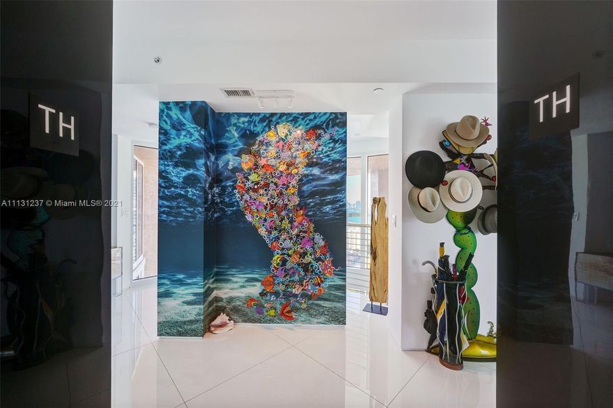 Completely remodeled 2-floor residence that feels like a glass home in the sky, boasting 5,450 SqFt to easily accommodate any special event or entertaining occasion. Mega sized flow-through living room and open kitchen with a bridge encased in glass leading to an 800+ SqFt panoramic Great Room with endless purposes such as an office, 2nd living room, gym etc. Endless direct views of the Atlantic Ocean, Biscayne Bay, Miami Skyline, and South Beach both day and night with incredible sunrises and sunsets. The lower floor of this townhouse offers all 3 bedrooms, providing excellent privacy and separation of space. The master bedroom overlooking the ocean offers his and hers bathrooms and closets, spa-like bathroom including a double rain shower and separate large jacuzzi tub with an ocean view