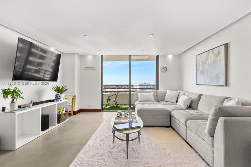 Located in the desirable Three Islands community, just a 15-minute walk to the beach and local restaurants. This 2-bedroom, 2-bath layout, features one of the best split-floorplan lines in the building. The unit has been tastefully remodeled throughout, showcasing a modern renovated kitchen with granite countertops, stainless steel appliances, custom cabinetry, and a stylish blue tile backsplash. The oversized living and dining areas flow seamlessly toward large sliding doors that open to an expansive balcony with stunning city and water views. The community offers exceptional amenities including 4 tennis courts, a fitness center, 2 heated pools, sauna, BBQ area, and a marina with dock space available upon association request. Beautifully landscaped grounds and a resort-style atmosphere make this the perfect place to call home. SELLER IS MOTIVATED. ALL ASSESSMENTS WILL BE PAID IN FULL BY THE SELLER AT CLOSING.