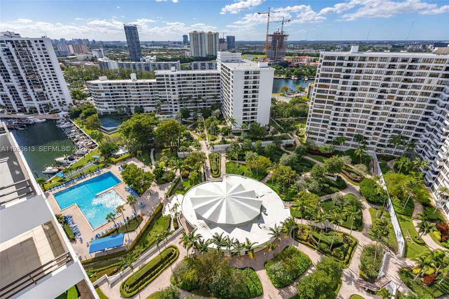 Located in the desirable Three Islands community, just a 15-minute walk to the beach and local restaurants. This 2-bedroom, 2-bath layout, features one of the best split-floorplan lines in the building. The unit has been tastefully remodeled throughout, showcasing a modern renovated kitchen with granite countertops, stainless steel appliances, custom cabinetry, and a stylish blue tile backsplash. The oversized living and dining areas flow seamlessly toward large sliding doors that open to an expansive balcony with stunning city and water views. The community offers exceptional amenities including 4 tennis courts, a fitness center, 2 heated pools, sauna, BBQ area, and a marina with dock space available upon association request. Beautifully landscaped grounds and a resort-style atmosphere make this the perfect place to call home. SELLER IS MOTIVATED. ALL ASSESSMENTS WILL BE PAID IN FULL BY THE SELLER AT CLOSING.