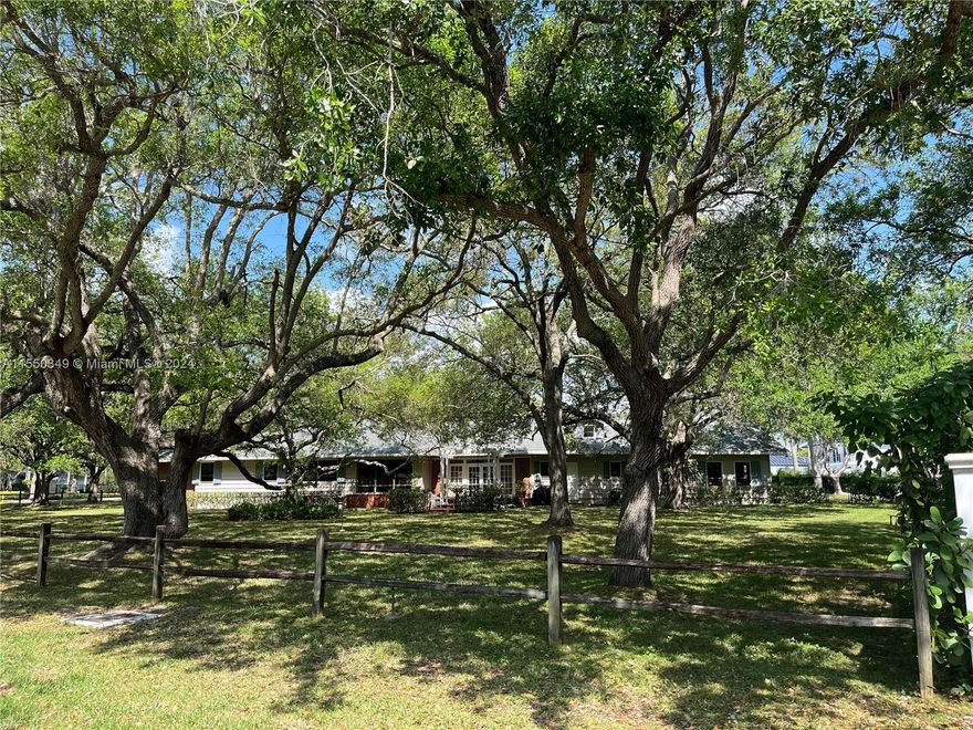 Build your dream home on this beautiful approx ONE ACRE, CORNER PINECREST LOT located in one of the most sought after neighborhoods in Miami.  Very peaceful street, in the proximity to brand new homes that have SOLD for $10 MILLION ++.  Wood frame house is surrounded by amazing, lush trees. 
Property is very close to top A+ rated schools like Gulliver and Westminster.   
Fantastic opportunity!  Not contingent on inspections. AS-IS.