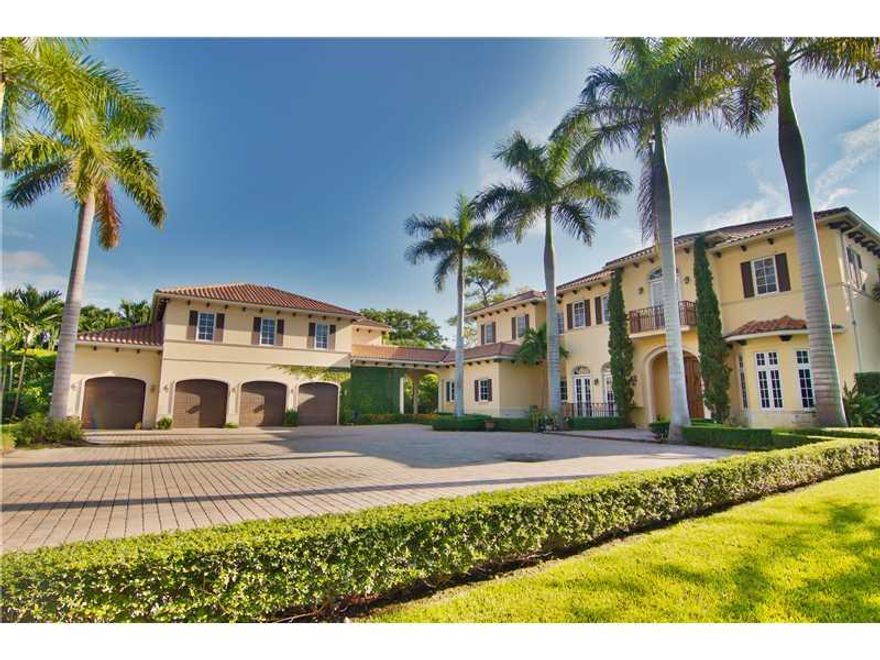 This stunning Mediterranean estate is located in the exclusive Ponce Davis neighborhood. The main house consists of 7 bedrooms (2 are master suites) and 7.5 baths. Additional features include an elevator, wine cellar, wet bar and more. This estate is situ ated on a beautifully landscaped and private acre. This home has a heated pool, cabana, summer kitchen, Sport Court basketball court and a 1/1 guesthouse above the 4 car garage. No detail has been spared.