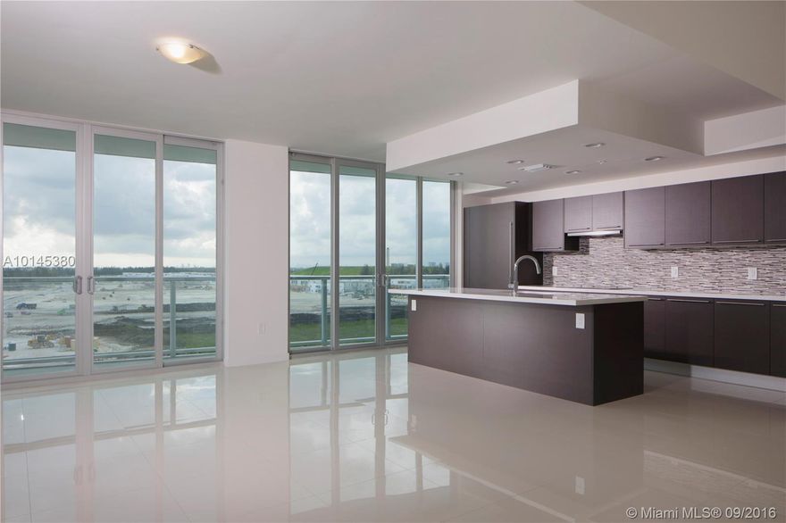 Large 3 bed/ 3 baths with 2 assigned parking spaces. 9" ceilings located in the heart of Doral surrounded by high-end residential housing! Brand new unit with porcelain tiles, floor to ceiling windows, high-end kitchen cabinets imported from Spain. Bosch appliances Washer/Dryer/Cable/Internet and WiFi in common areas and smart technology included. Ready to move in. The community will have restaurants and retail. Small pets are allowed.