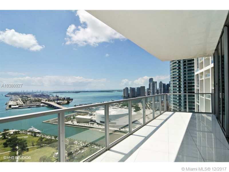 THE VIEW IS SPECTACULAR! CORNER 3/2/1 UNIT WITH TONS OF NATURAL LIGHT, FLOOR TO CEILING WINDOWS FACING EAST AND SOUTH. DEVELOPER MODEL WITH BEAUTIFUL FINISHES INCLUDING CUSTOM MILL WORK AND MOTORIZED WINDOW COVERINGS. IN PRISTINE CONDITION. LOTS OF CLOSET SPACE ! WHITE KITCHEN AND FLOORS! THREE NICE SIZED BEDROOMS. WONT LAST LONG. A MUST SEE! ABSOLUTELY NO SMOKING OR PETS.