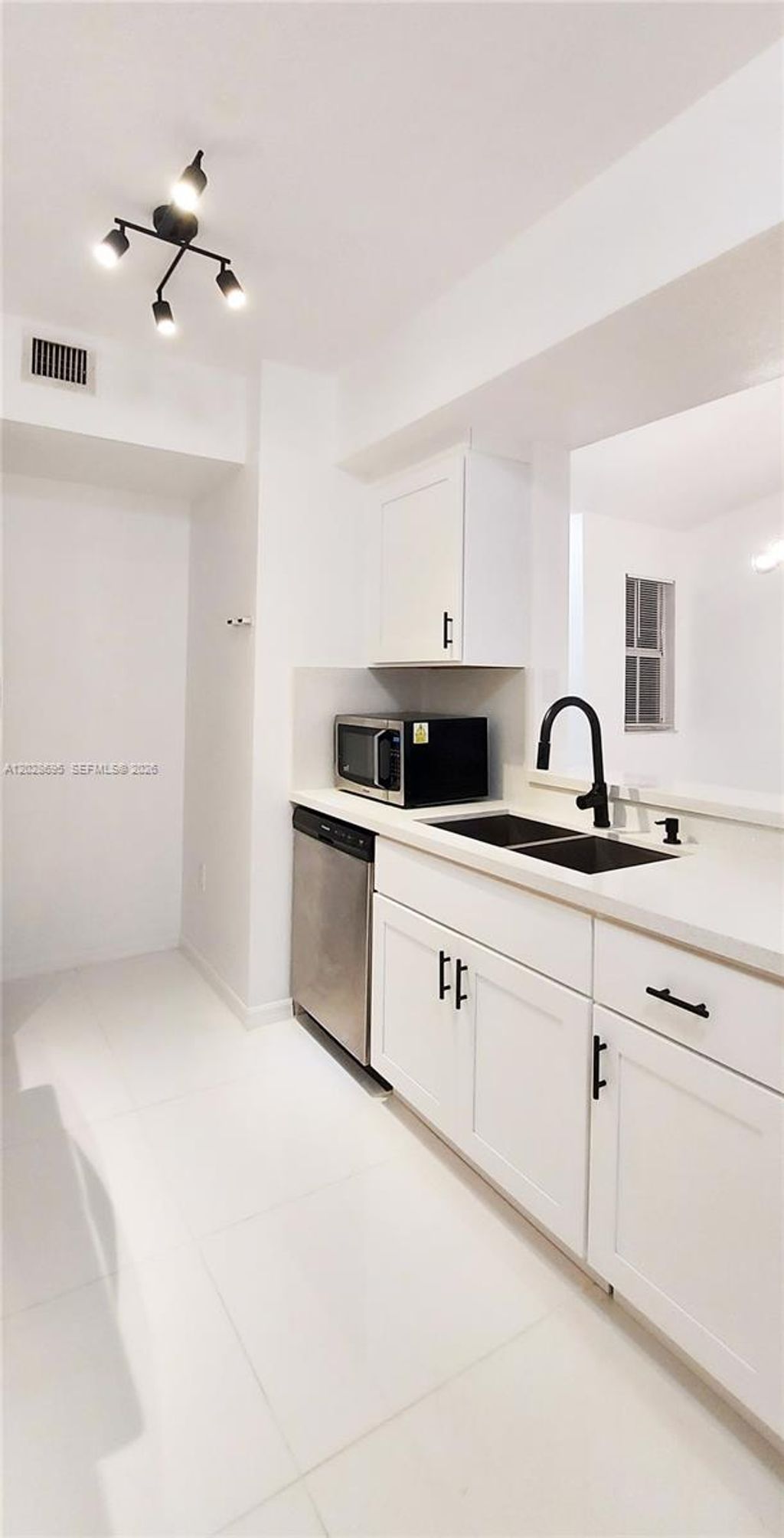 Photo of 2501 Centergate Dr #203, Miramar, FL 33025 (MLS # A12028695)