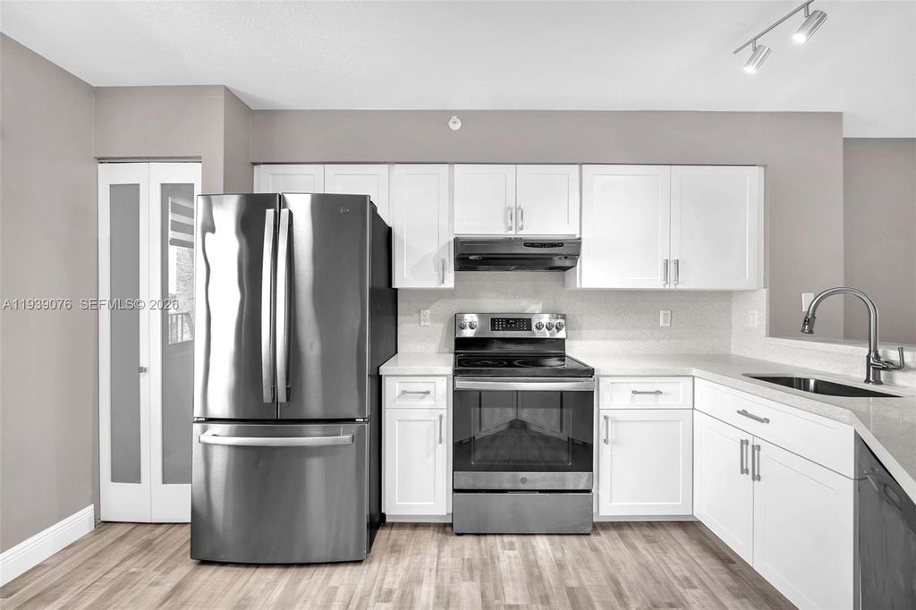 Photo of 2112 S Cypress Bend Dr #802, Pompano Beach, FL 33069 (MLS # A11939076)