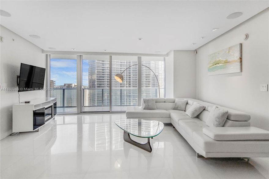 Available December 1st, 2025. Experience refined living at the exclusive Epic West. This 2BR/2.5BA + den residence boasts some of the most breathtaking views in the building—spanning the Brickell Key skyline, Biscayne Bay, and Miami’s glittering cityscape. The open Italian-designed kitchen features premium finishes and flows seamlessly into the living space, complemented by elegant white porcelain flooring throughout. Step onto the expansive glass-railed balcony and take in panoramic views from sunrise to sunset. As a resident, indulge in world-class hotel amenities and the unparalleled convenience of Downtown and Brickell at your doorstep. A rare opportunity to call one of Epic’s most coveted residences home.