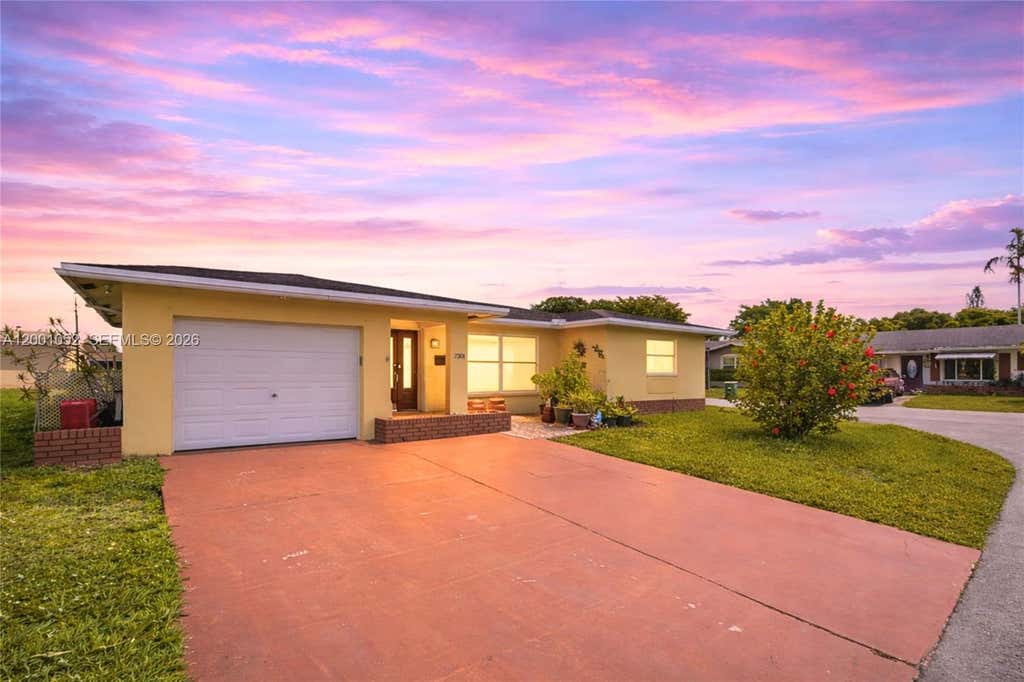 Photo of 7301 NW 57th Pl, Tamarac, FL 33321 (MLS # A12001052)