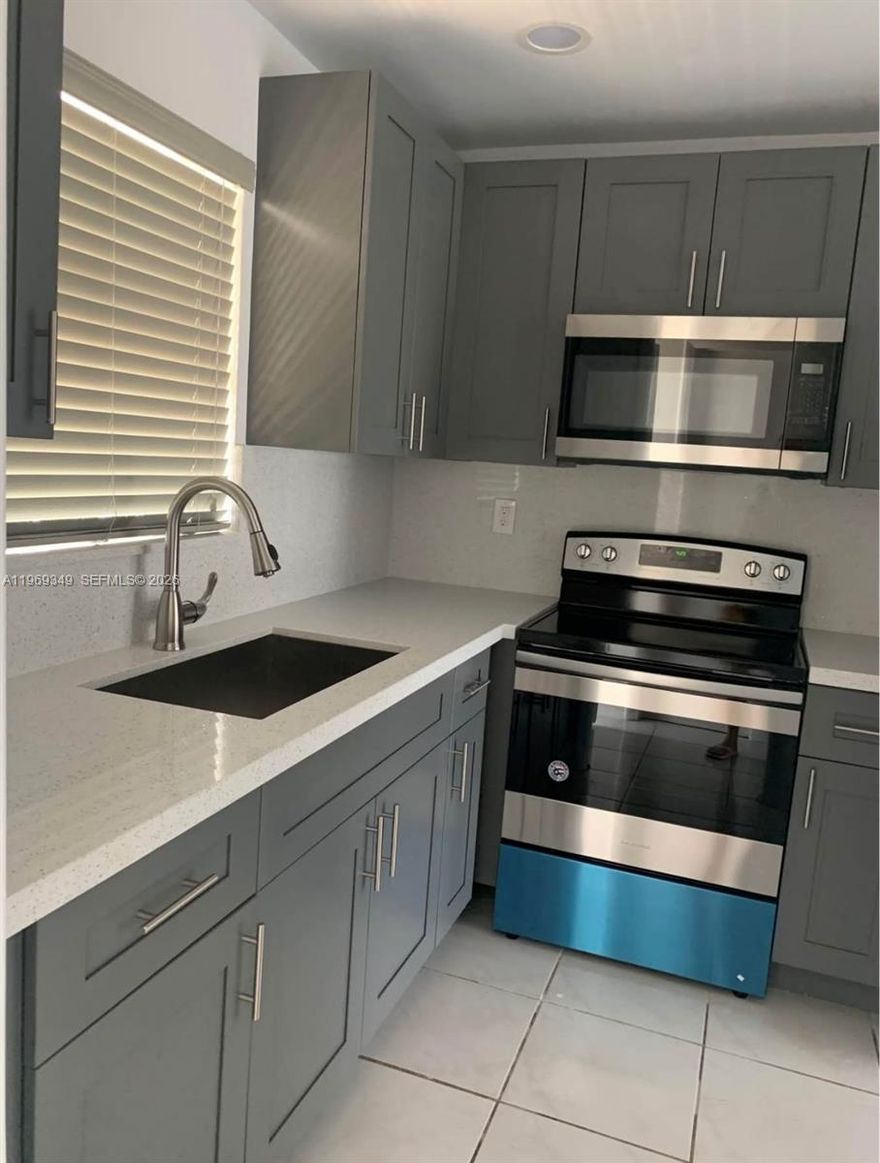Updated/renovated one bedroom/one bath apartment centrally located (Dadeland area).  This unit features a remodeled kitchen with stainless steel appliances and quartz countertop, updated bath, tile floors in main living area and laminate in bedroom.  Balcony overlooking pool area/garden. Building is located minutes from Dadeland Mall, major arteries of transportation and restaurants.   Community offers pool, BBQ & picnic area, clubhouse, laundry facility and parking.  Unit is currently rented, excellent for investors.