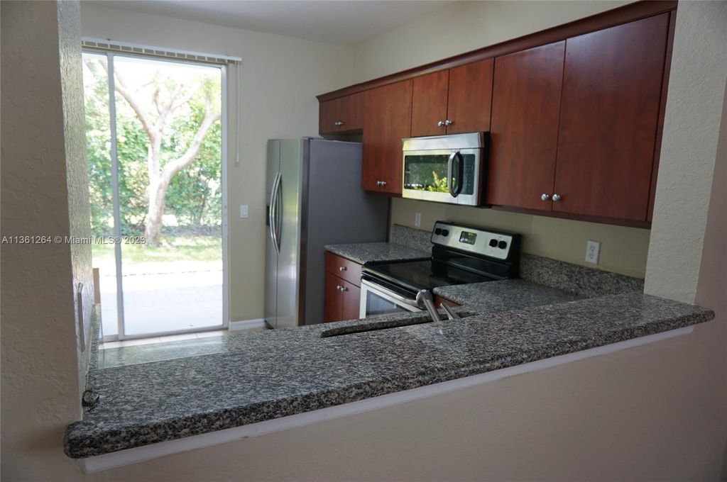 Photo of 1955 Hibiscus Ln #-, Riviera Beach, FL 33404 (MLS # A11361264)