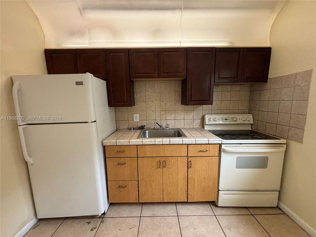 Photo of 7311 NW 37th St #1, Davie, FL 33024 (MLS # A11968200)