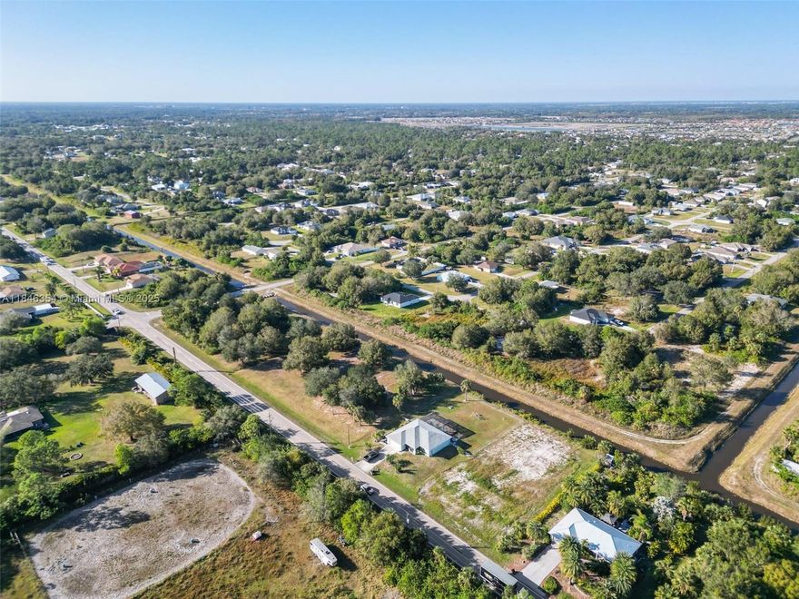 Great opportunity to build your perfect home on this dead end street lot for privacy. Lot is located in a desirable location in Lehigh Acres with proximity to airport, schools, I-75, restaurants, Frank Mann Preserved and Trailhead Park.