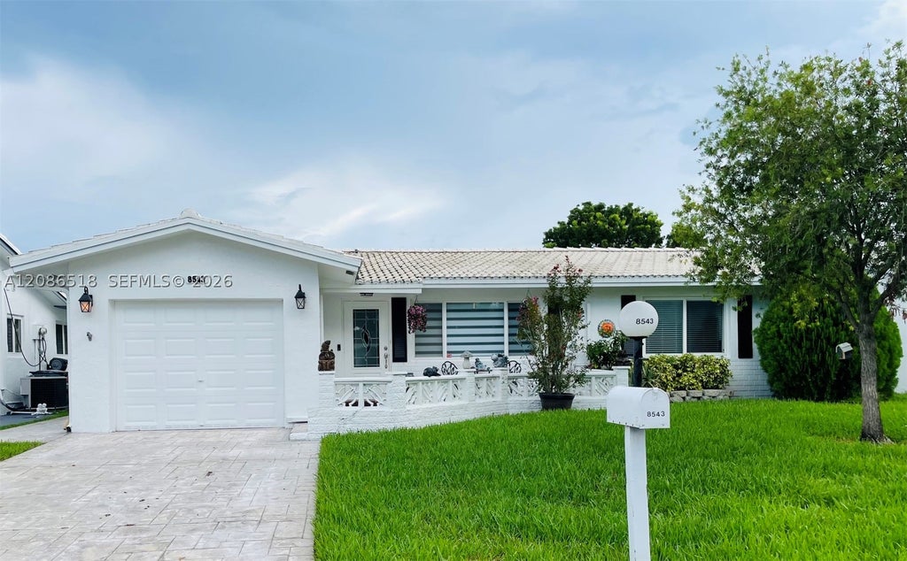 Photo of 8543 NW 13th Ct, Plantation, FL 33322 (MLS # A12086518)