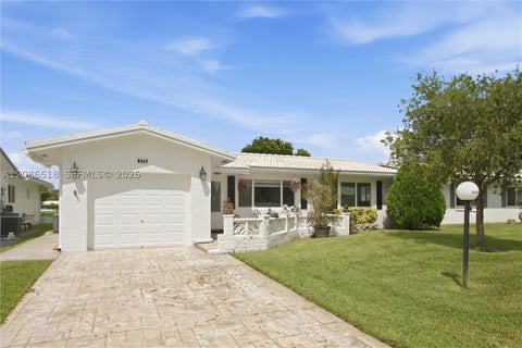 Photo of 8543 NW 13th Ct, Plantation, FL 33322 (MLS # A12086518)