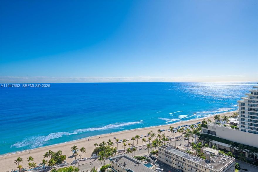 Brand new construction featuring the hottest corner line available. This exceptional two bedroom, two bath residence with an enclosed den offers direct ocean, Intracoastal, and city views from a spacious wraparound balcony. Floor-to-ceiling glass fills the home with natural light, while generous living areas and oversized walk-in closets create a refined yet comfortable living experience.

An impressive suite of amenities enhances everyday living and entertaining, from movie nights and private theater screenings to catered dinners and intimate gatherings. Indoor spaces include The Wave with lounge seating, fireplace, bar, billiards, and card tables, as well as Seasons featuring a wine bar, catering kitchen, communal dining table, and reservable event terrace. Wellness amenities include a double-height fitness center overlooking tropical gardens and a glass-enclosed movement studio. The Hub offers a modern work-from-home environment with private offices, conference room, and privacy pods.

Outdoors, a spectacular elevated beachfront amenity deck showcases panoramic Atlantic Ocean views with a resort-style pool, lap pool, spa, cabanas, fire pit lounges, outdoor kitchen, and poolside bar. Enjoy endless ocean vistas, blue skies, and luxury coastal living at its finest.