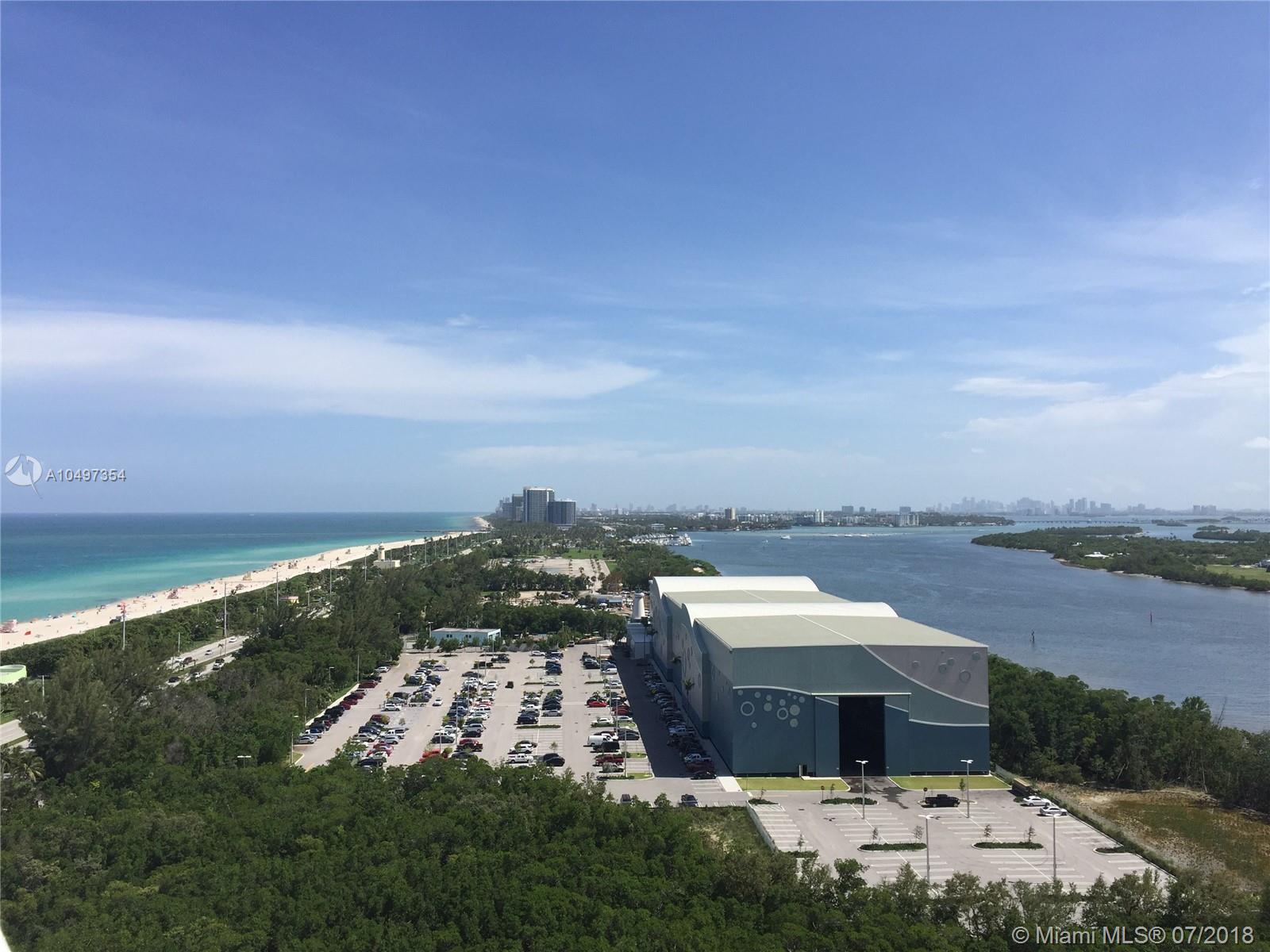 Fully remodeled condo at Arlen House East Building, with panoramic views of intracoastal waterways, Oleta State National Park, the ocean at Haulover, and all the way down to downtown Miami! A spacious 1-bedroom with remodeled en-suite and a guest bathrooms, new vanities, onyx looking tile flooring throughout, freshly painted, all LED lighting. Brand new kitchen with granite counters and backsplash, and lots of counter space, new appliances too! Large balcony accessible from bedroom and living room to enjoy the sunrise, sunset, and city skyline. Brand new lobby, and many amenities in the building, minutes from grocery stores, malls, and restaurants. Live across the street from the beach at a fraction of the price! You wouldn't want to miss out on this opportunity!