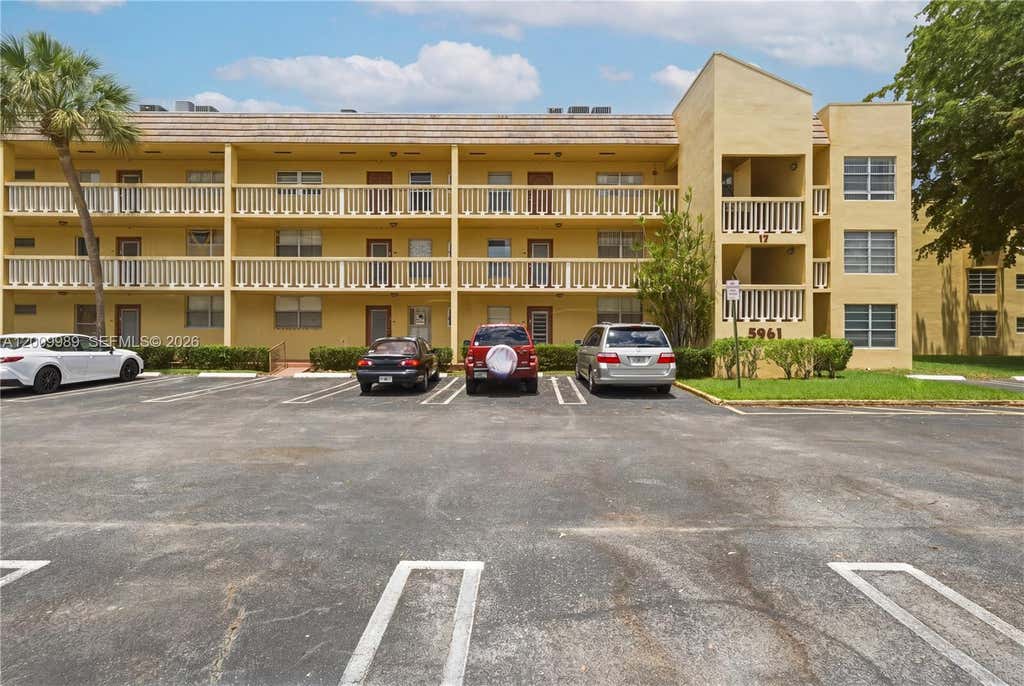Photo of 5961 NW 61st Ave #111, Tamarac, FL 33319 (MLS # A12009989)