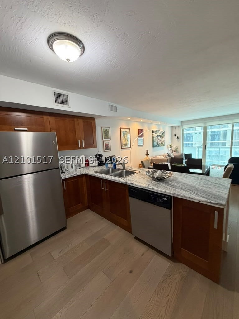 9499 Collins Ave 907