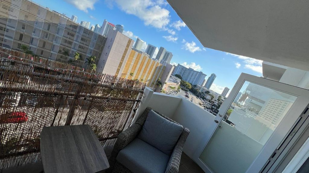 Photo of 401 Golden Isles Dr #716, Hallandale Beach, FL 33009 (MLS # A11779704)