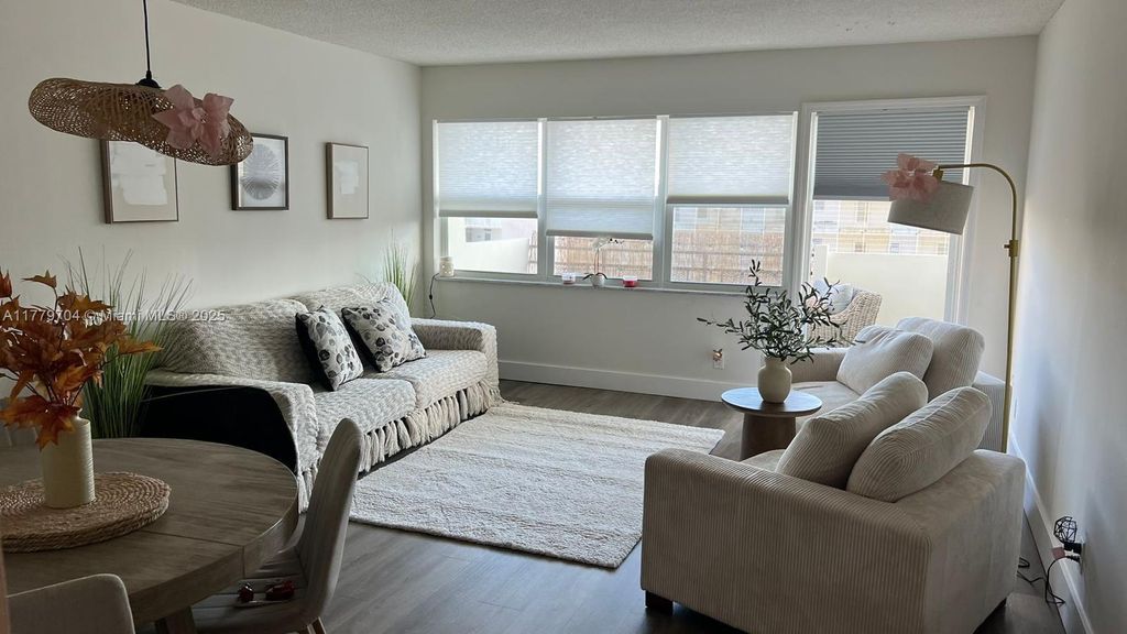 Photo of 401 Golden Isles Dr #716, Hallandale Beach, FL 33009 (MLS # A11779704)