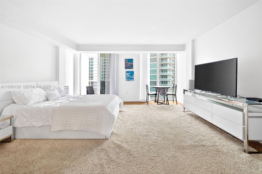 Opportunity! Best priced ocean view and high rise Studio available, with low holding cost. Perfect home, Rental property or both.   
Perfectly positioned directly on the beach, this impeccably finished studio captures breathtaking views of the ocean, gardens, and pool through expansive windows and comfortable balcony.
This bright and airy unit features floor-to-ceiling glass, open living/sleeping space, a well-appointed kitchen with modern appliances, spacious bathroom, and ample closet storage. Enjoy resort-style living with direct beach access, oceanfront pool, fitness center, 24 hours concierge, security valet service, market cafe, theatre, conference and party room. Just moments from the world-renowned Bal Harbour Shops, dining, and coastal walking paths.   
The unit is rented for $2,650/month and the lease finish on September 2026.
