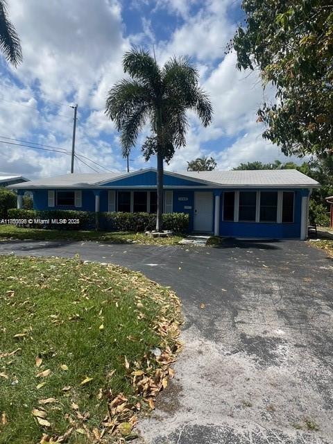 This renovated 4BD/3BA dream home in the desirable Coral Ridge Isles neighborhood is sure to impress. The open concept kitchen features beautiful cabinetry and provides abundant natural light through its many windows. The roof was redone in 2017, and the house features hurricane-resistant windows, along with new electrical and surveillance installations. Conveniently located near Holy Cross Hospital, the area offers a vibrant dining and shopping scene and is just a short drive from the beach. MOTIVATED SELLER: Bring in all offers. Tenants already in place!