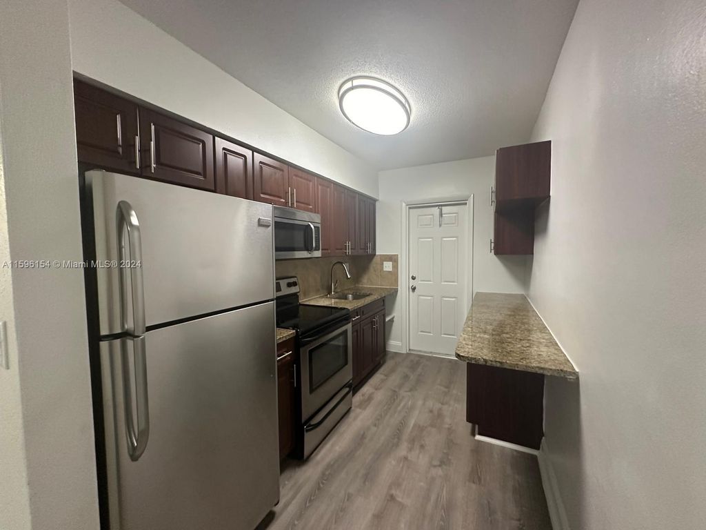 Photo of 110 NE 19th Ave #7, Deerfield Beach, FL 33441 (MLS # A11596154)