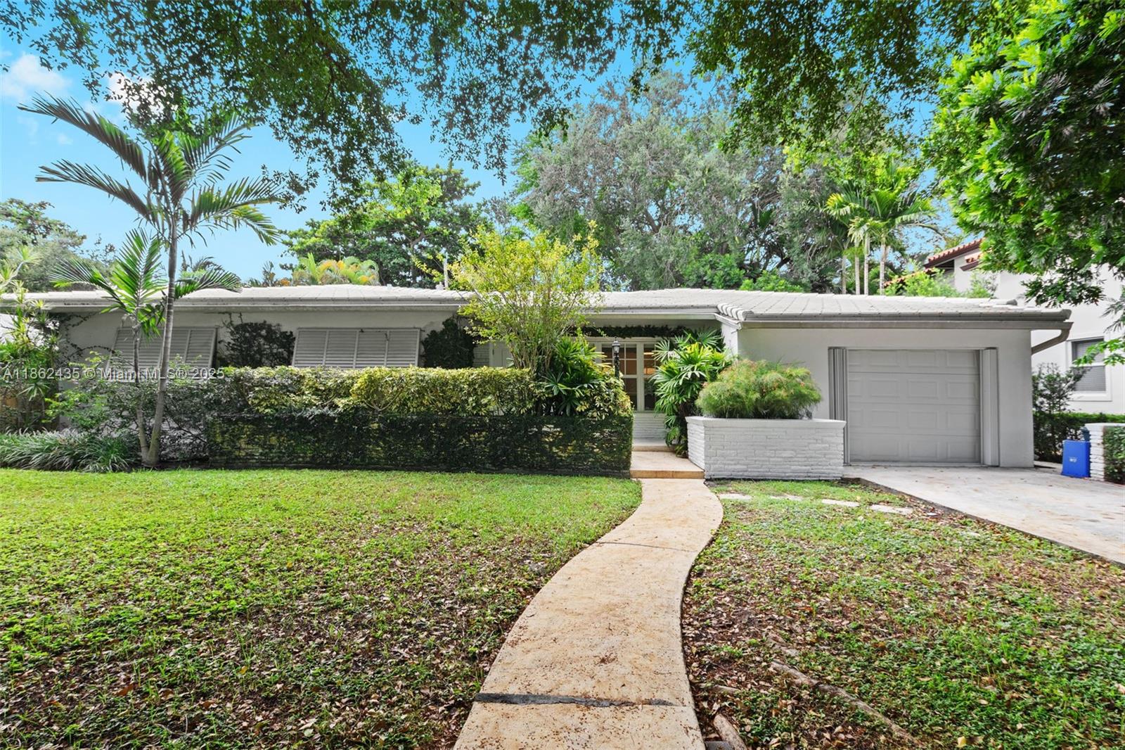 Your opportunity to live on this beautiful tree-lined street in the heart of Coral Gables, this charming 3-bedroom, 2-bath residence rests on a spacious 7,875 sq. ft. lot. A classic home with original terrazzo floors, a one-car garage and both bathrooms have been renovated. Step out onto the expansive covered patio, perfect for year-round enjoyment, overlooking a fully fenced backyard. Ideal for summer barbecues, casual gatherings, or simply relaxing outdoors with family and friends. Perfectly positioned near the iconic Biltmore Hotel, Granada Golf Course, Miracle Mile, and top-rated schools, the home offers a lifestyle of elegance and convenience. Request a tour today!