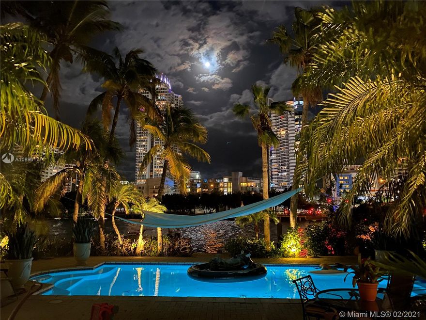 Tenant finally moved out.  Recently renovated and finally available to show after May 7, 2021.  Beautiful and Luxurious Mediterranean Waterfront home. 6 Bedroom 6.5 bathrooms in private gated Allison Island. Rough Marble Satururnia 12 by 24 floors throughout living room, dining room and kitchen,  wood floors in family room and in 5 bedrooms.  Built by owner with quality finishes throughout. Kitchen updated in 2012. High Ceilings, hurricane french doors throughout. Huge entertaining area  inside and outside.  A very large covered outside pool deck.  Also has a stand alone Gazebo with shower and bathroom for pool,  storage and barbecue area.  This home also has a large dock that will accommodate a large boat with no fixed bridges to Ocean or Bay. Professional pictures to follow.