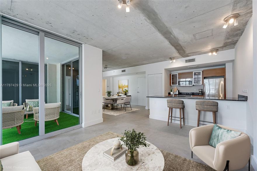 Welcome to your dream home nestled in the vibrant neighborhood of Midtown! This beautifully appointed 1 bed / 1.5 bath condo offers a perfect balance of comfort with convenience. Upon entrance an airy living room welcomes you in with an enchanting view of the pool area, plus direct access to generous open balcony, ideal spot to savor your morning coffee or unwind after a long day. The primary bedroom bathed in an abundance of natural light comes with a primary bath featuring a single sink vanity and a tub-shower combination, offering convenience and privacy both. Feel resort style amenities at 2Midtown like fitness center, Pool, concierge, valet parking and many more. Few steps away from some hottest restaurants and stores, blocks away from Wynwood Art District and Miami Design District.