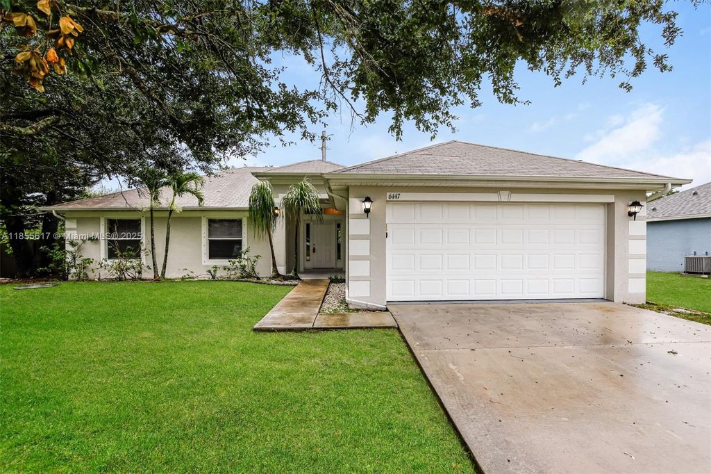 Photo of 6447 NW Halibut St, Port St Lucie, FL 34983 (MLS # A11855617)