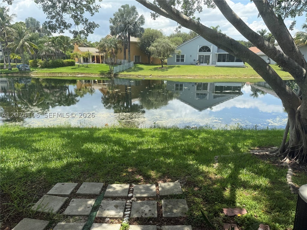 Photo of 9454 S Palm Cir S #9454, Pembroke Pines, FL 33025 (MLS # A12074106)