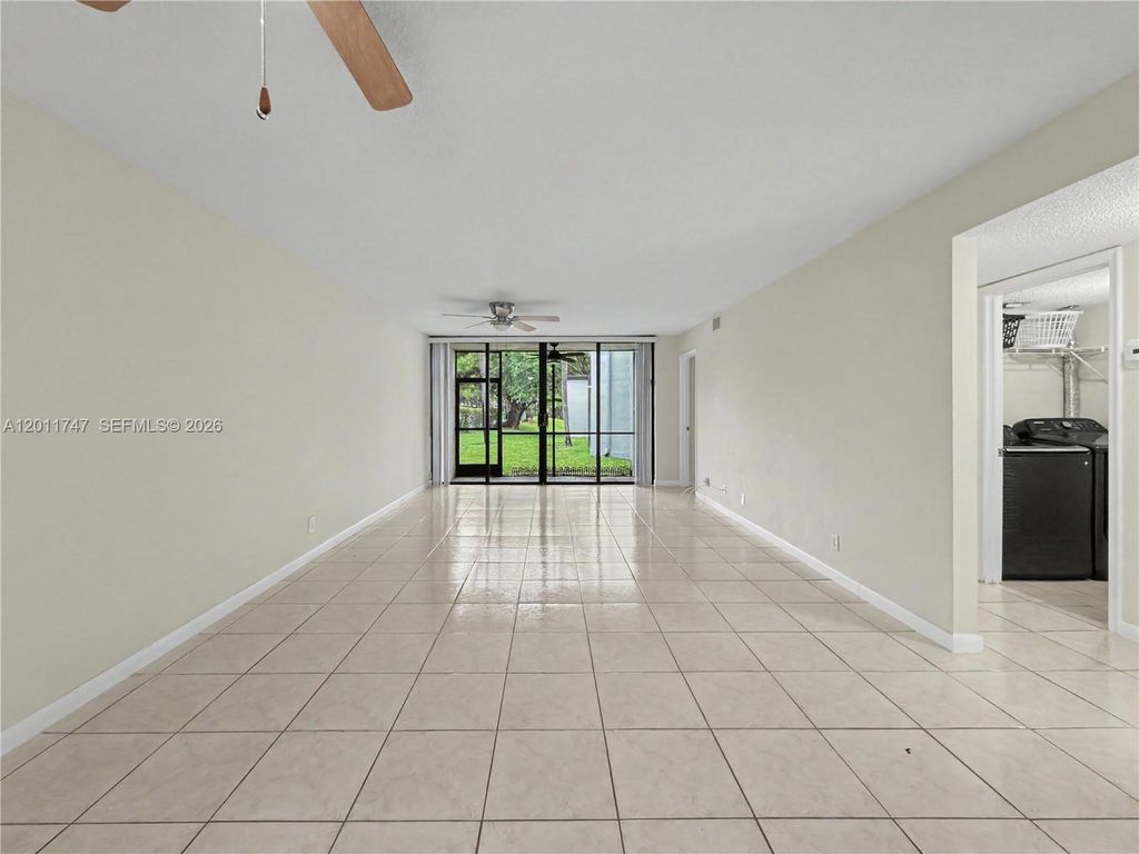 Photo of 11200 Taft St #11200, Pembroke Pines, FL 33026 (MLS # A12011747)