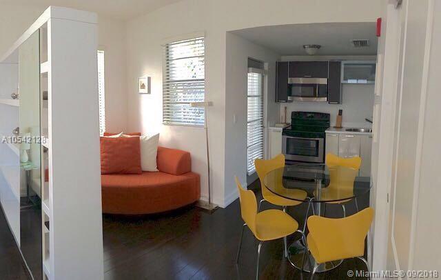 Beautiful Studio central South Beach historic ArtDeco . Open floor plan kitchen/living area,dark hardwood floors,updated kitchen/bath,stainless steel appliances,tankless electric water heater,glassed-in shower,washer/dryer,wa lk-in closet,central air conditioning,residential street permit parking out front&city garage around the corner to rent a space.NO pets.