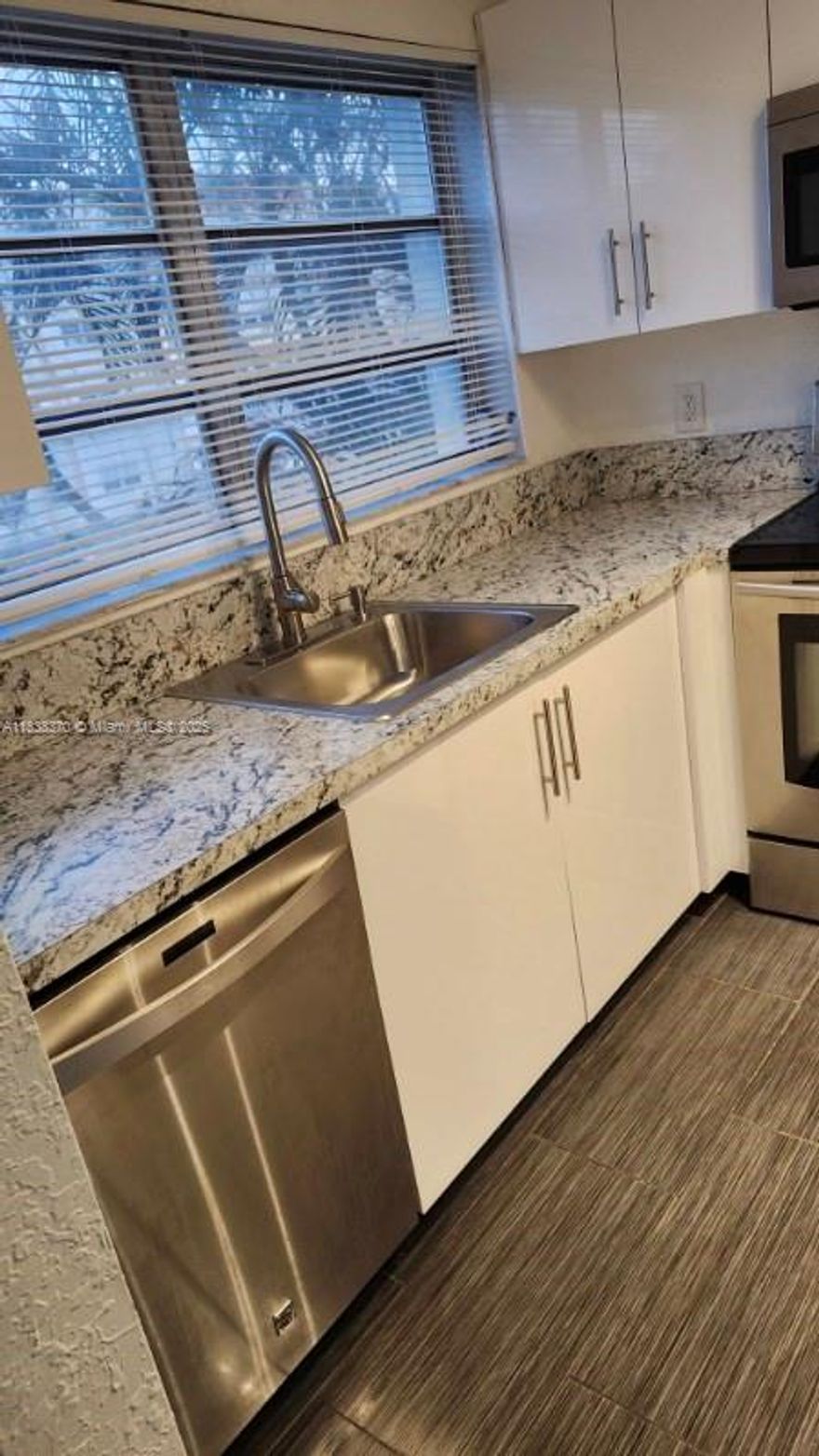 SPACIOUS 2 BEDROOMS 2 BATHROOMS CYPRESS TREE CONDO UNIT.  FRESHLY PAINTED.  NEW KITCHEN CABINETS.  NEW BATHROOM CABINETS.