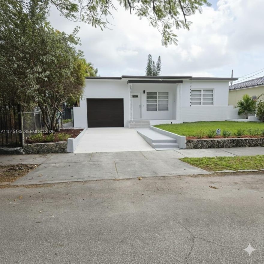 BEAUTIFULLY UPDATED 3 BED 2 BATH WITH LIVING ROOM, DINING ROOM, FAMILY ROOM, ENCLOSED GARAGE,  DEN/OFFICE IN PRIMARY BEDROOM, SEPARATE LAUNDRY ROOM AND LARGE FRONT AND REAR PATIO AREA. TREE LINED STREET. STUNNING KITCHEN AND NICELY UPDATED BATHROOMS. T5-L ZONING. IN MIAMI'S MIAMI 21 ZONING T5-L URBAN CENTER LIMITED IS A PEDESTRIAN FOCUSED ZONE ALLOWING MIXED USES LIKE MULTI FAMILY ,LIMITED COMMERCIAL,OFFICE ,LODGING AND COMMUNITY CENTERS AIMING FOR A SMALL TOWN FEEL PROMOTING WALKABILITY. PLEASE REFER TO CITY OF MIAMI ZONING FOR SPECIFIC ZONING QUESTIONS.