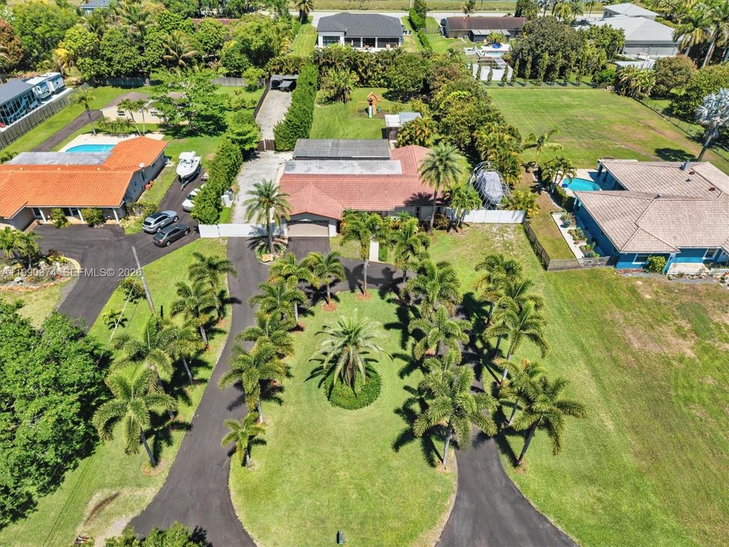 Photo of 14051 SW 15th Ct, Davie, FL 33325 (MLS # A11990374)